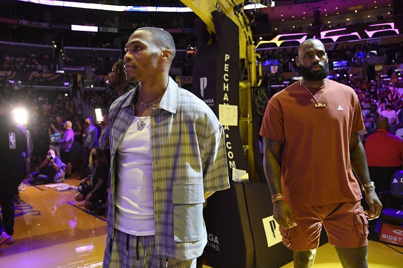 LeBron James and Russell Westbrook look on during the Brooklyn Nets vs Los Angeles Lakers game.