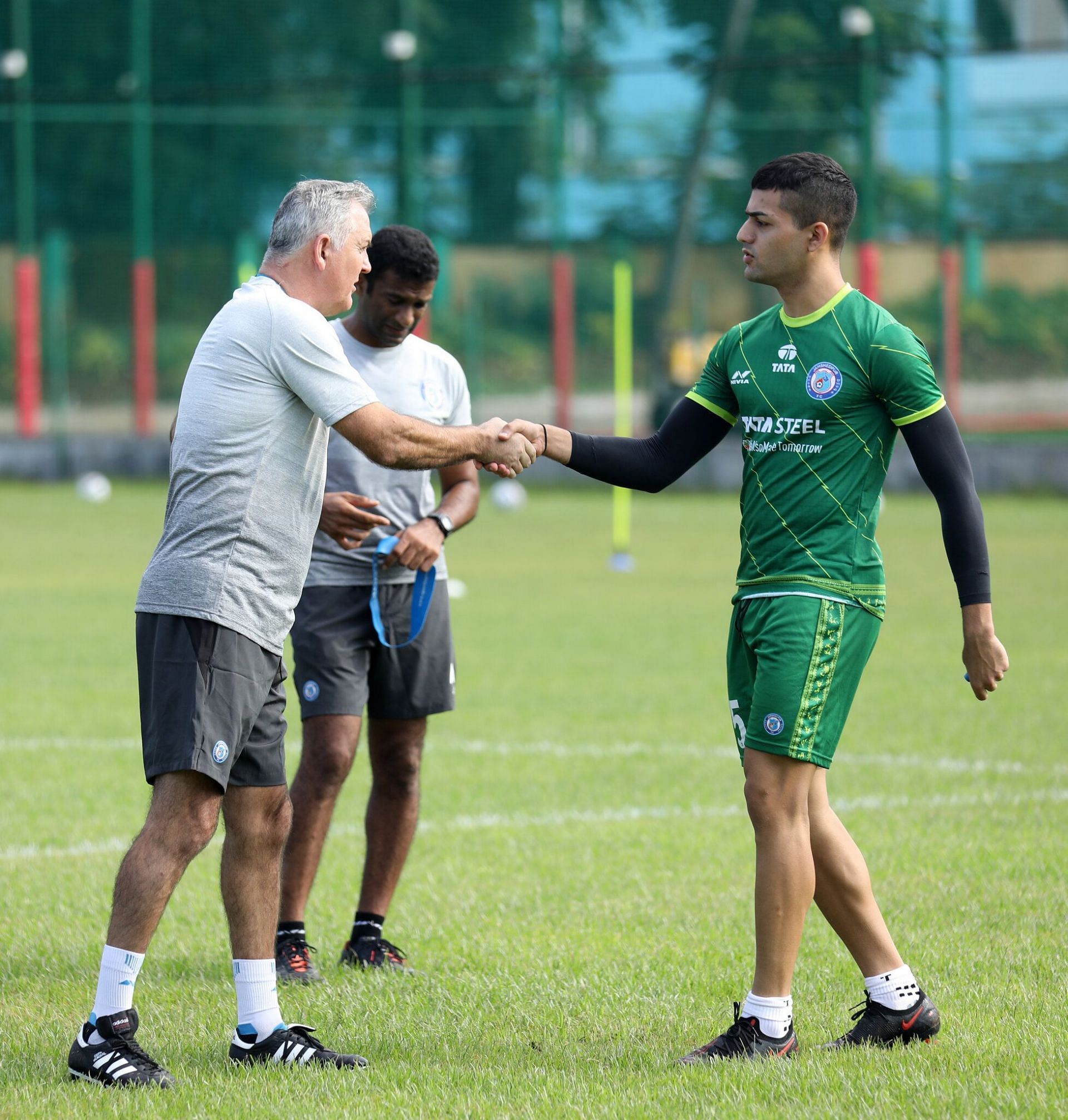 Ishan Pandita (right) with Jamshedpur manager Owen Coyle (Via Jamshedpur FC)