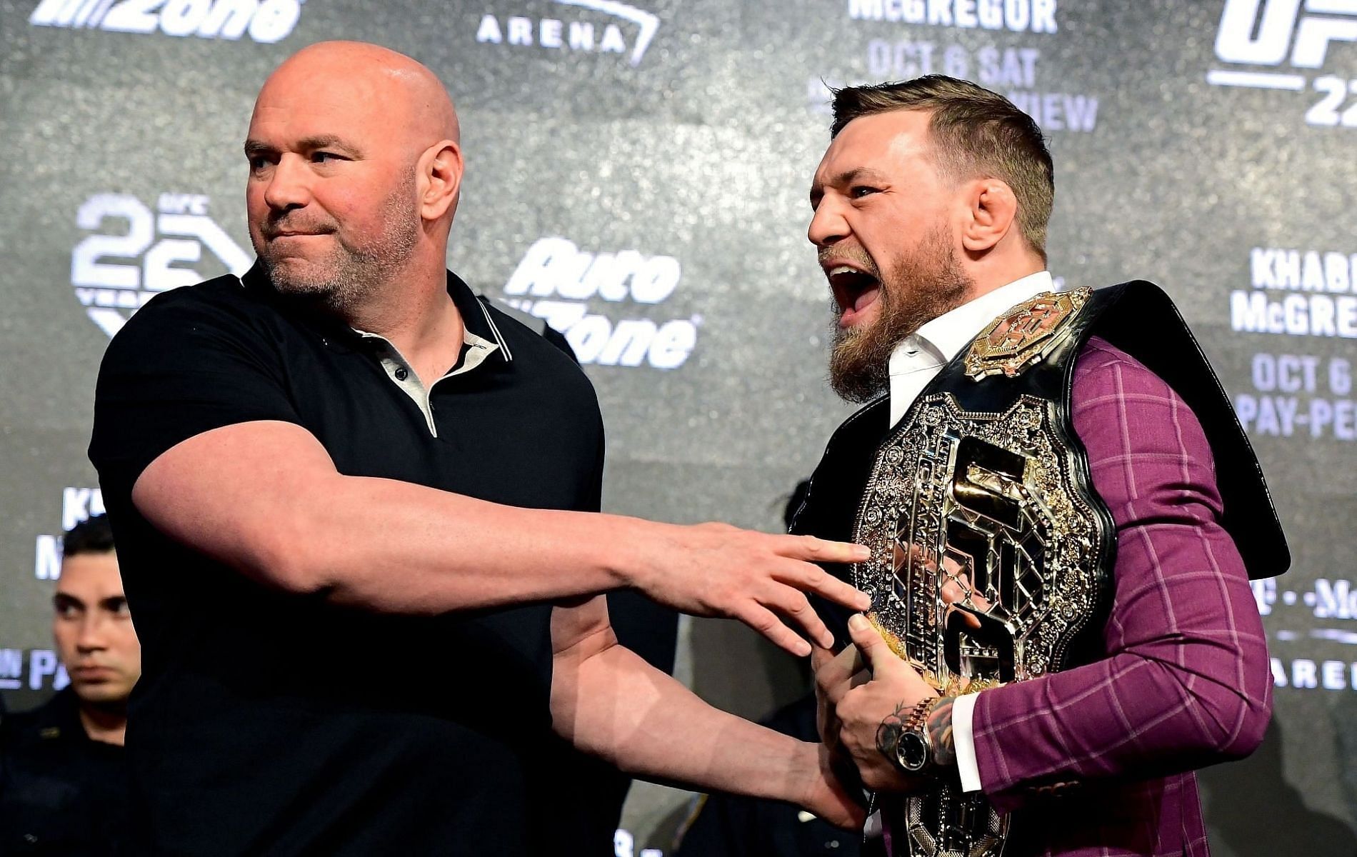 Dana White holds back Conor McGregor during UFC 229 Press Conference
