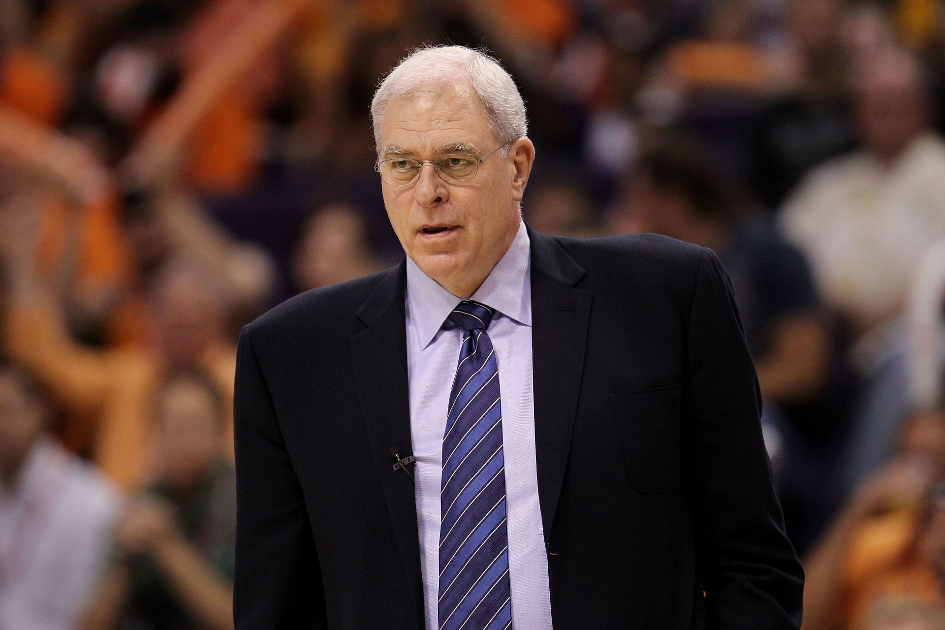 Head coach Phil Jackson of the Los Angeles Lakers stands by the bench in the first quarter of Game Four of the Western Conference Finals against the Phoenix Suns during the 2010 NBA Playoffs at US Airways Center on May 25, 2010 in Phoenix, Arizona.