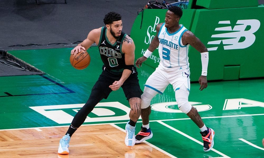 Jayson Tatum of the Boston Celtics against Charlotte Hornets&#039; Terry Rozier [Source: USA Today]