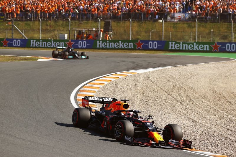 Max Verstappen leads Lewis Hamiltonduring the 2021 Dutch Grand Prix at Circuit Zandvoort, Netherlands. (Photo by Bryn Lennon/Getty Images)