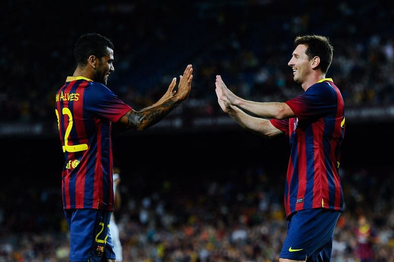 Dani Alves (left) had a great understanding with Lionel Messi on the field.