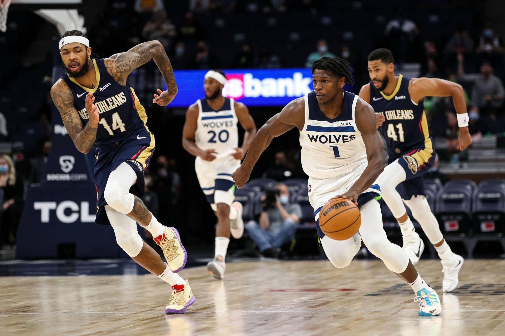 Minnesota Timberwolves star Anthony Edwards pushes the ball up court against the New Orleans Pelicans