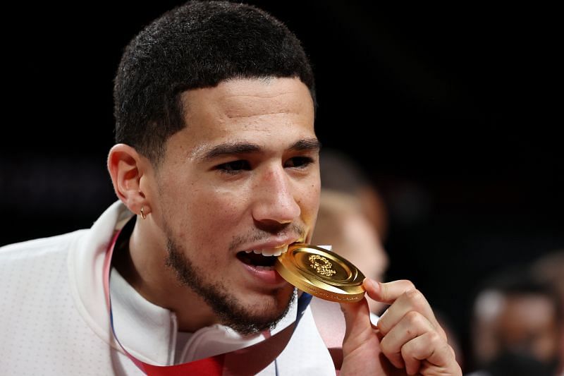 Phoenix Suns&#039; Devin Booker with his Olympic gold medal.