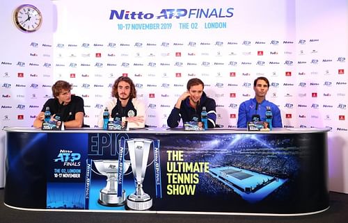 Alexander Zverev, Stefanos Tsitsipas and Daniil Medvedev with Rafael Nadal (R)