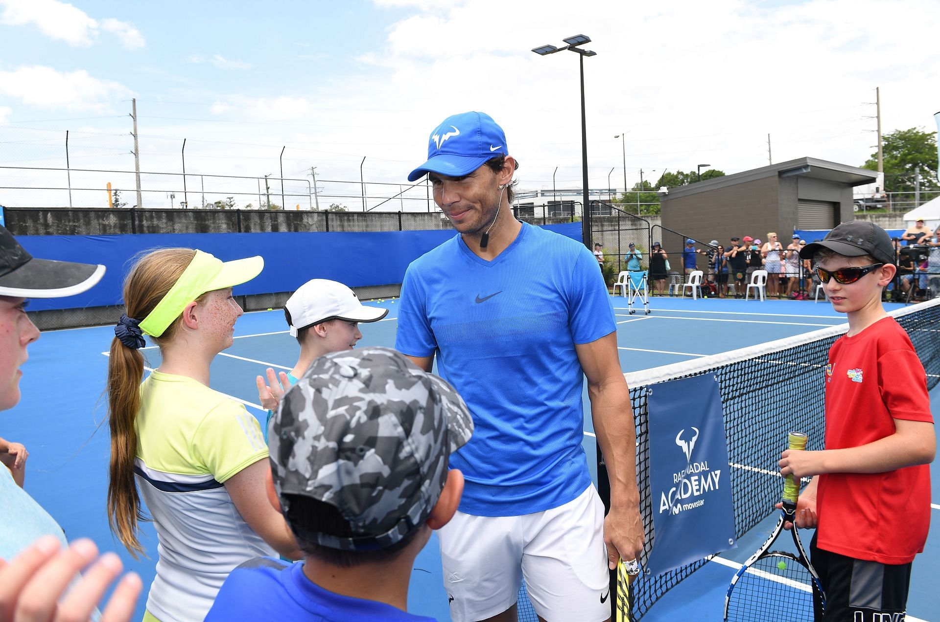 Rafael Nadal interacting with youngsters selected for the Academy in Brisbane, 2019