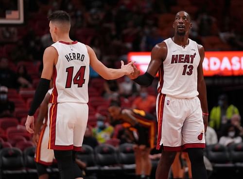 Tyler Herro and Bam Adebayo celebrate a play