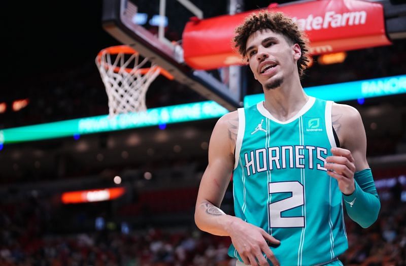 LaMelo Ball #2 of the Charlotte Hornets reacts after scoring a basket against the Miami Heat int eh fourth quarter during the preseason game at FTX Arena on October 11, 2021 in Miami, Florida.