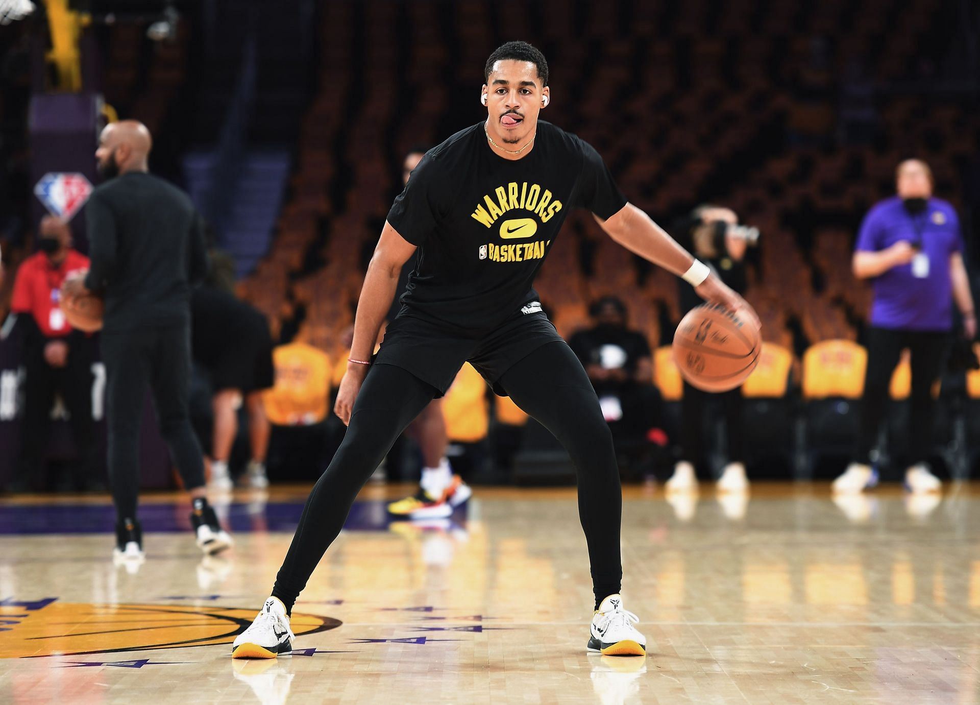 Jordan Poole #3 of the Golden State Warriors shoots warm ups prior to the season opener against Los Angeles Lakers at Staples Center on October 19, 2021 in Los Angeles, California.
