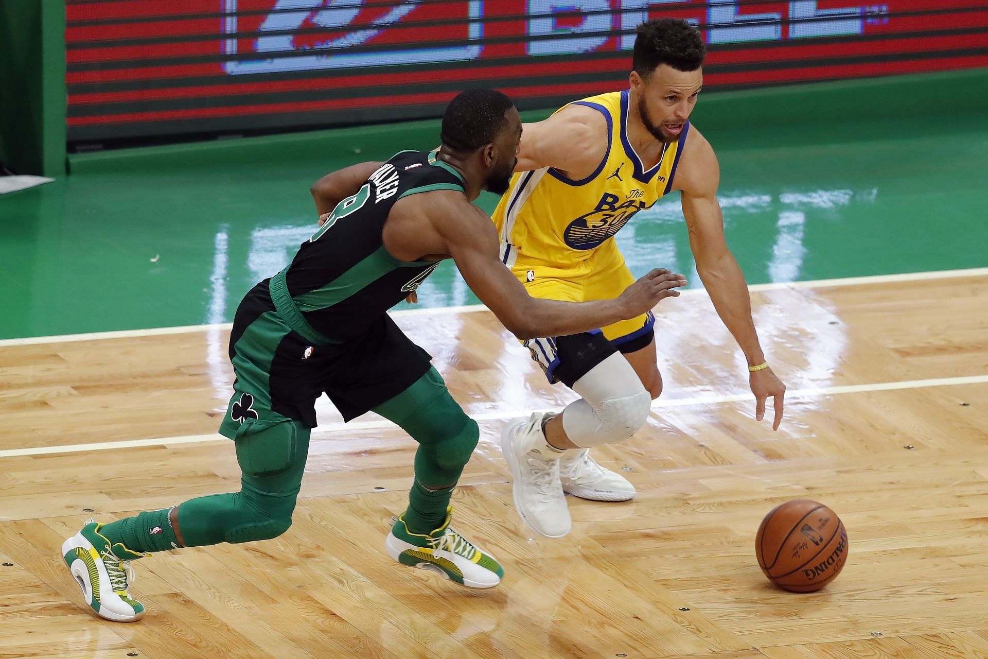 Stephen Curry in action against the Boston Celtics. (Photo Credit: AP.)