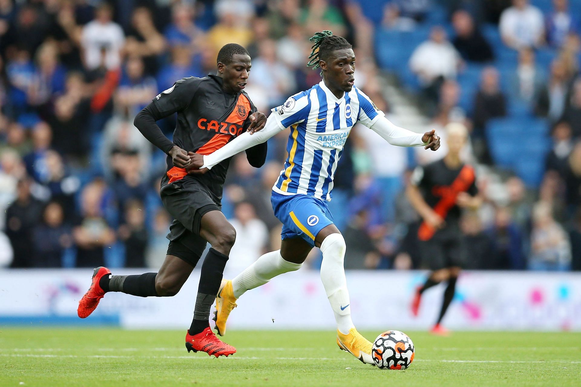 Abdoulaye Doucoure and Yves Bissouma battling in the Premier League