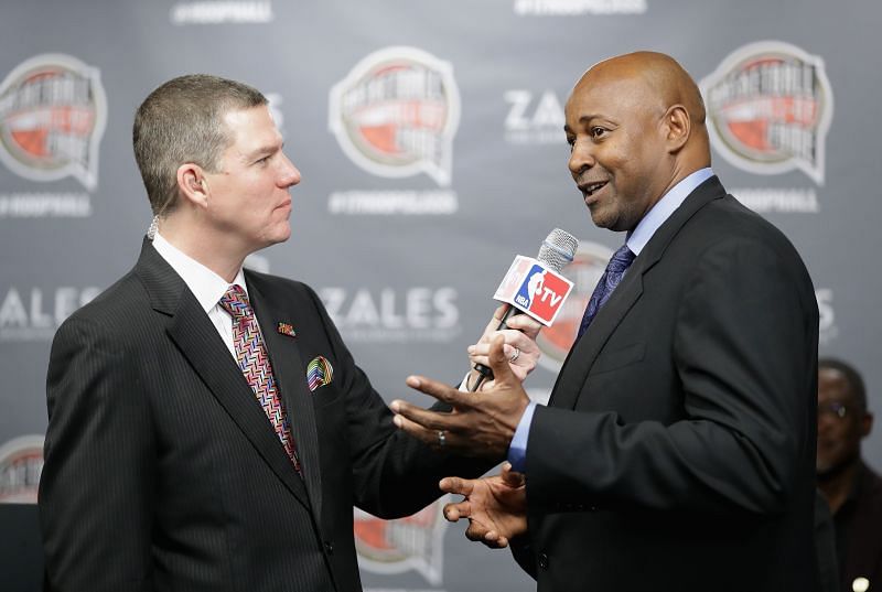 Naismith Memorial Basketball Hall of Fame finalist Sidney Moncrief (R) is interviewed.