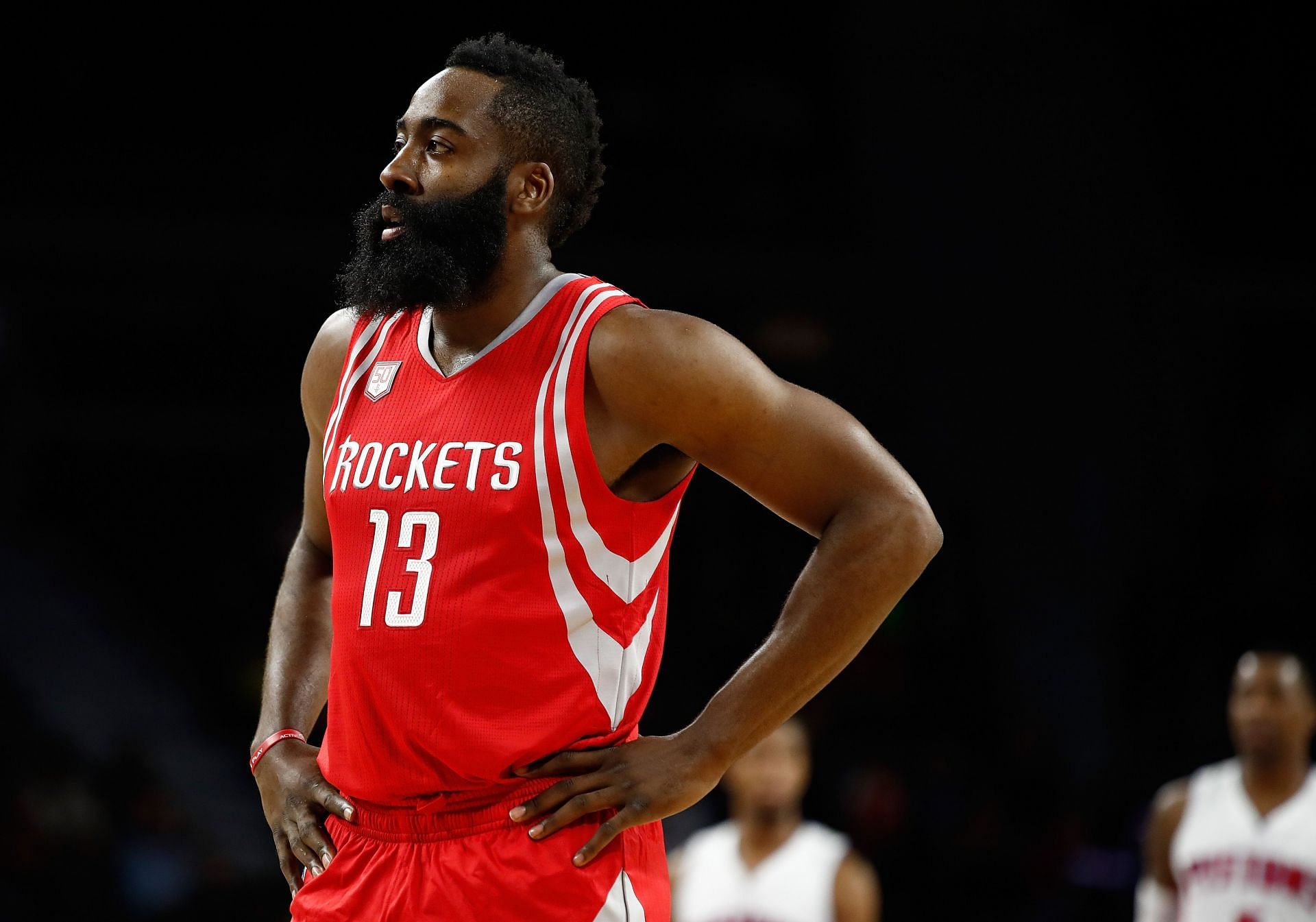 James Harden (#13) of the Houston Rockets looks on while playing the Detroit Pistons.