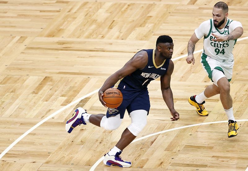Zion Williamson #1 of the New Orleans Pelicans drives to the basket past Evan Fournier #94 of the Boston Celtics during the second quarter at TD Garden on March 29, 2021 in Boston, Massachusetts.