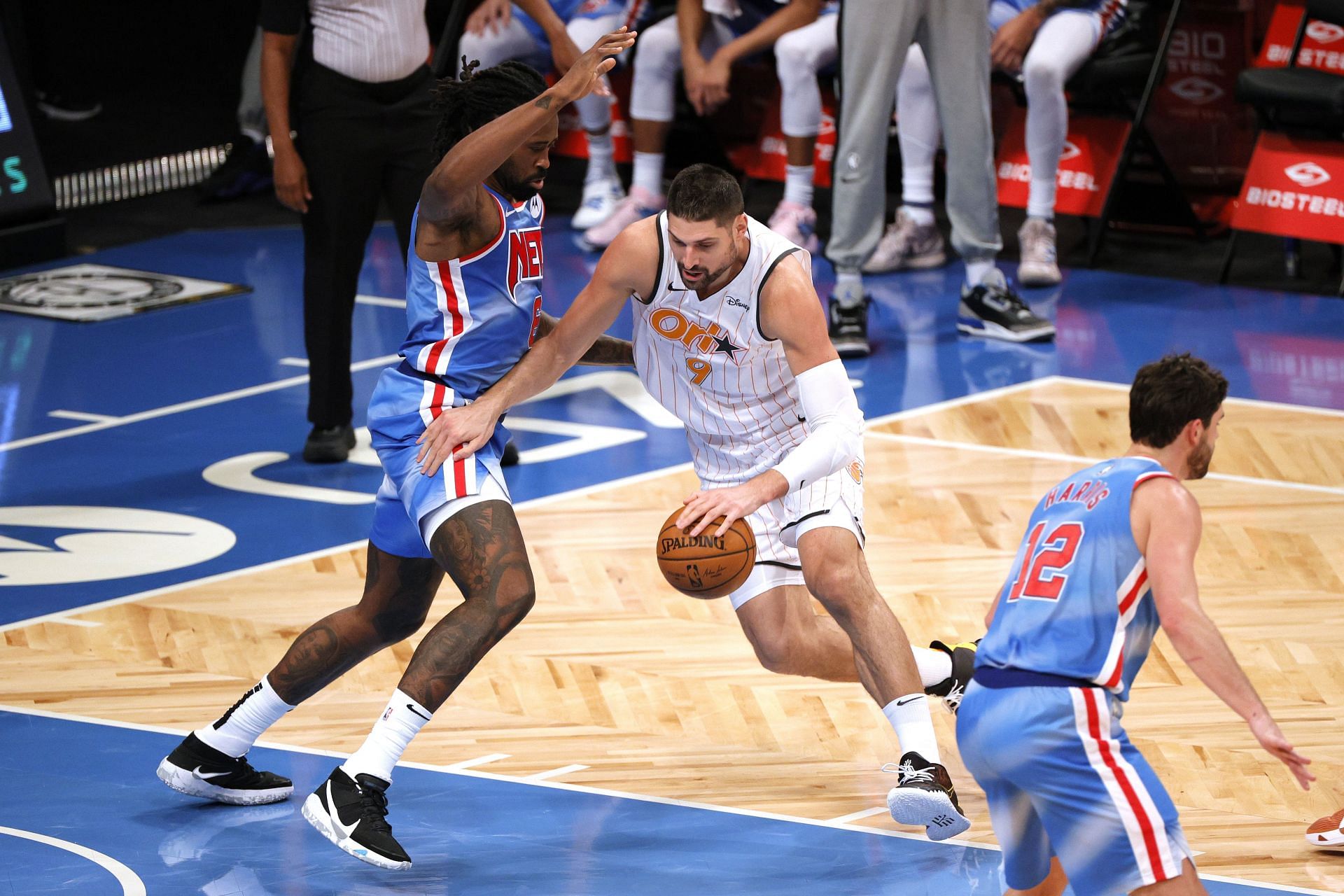 Nikola Vucevic #9 on the Orlando Magic driving into the paint