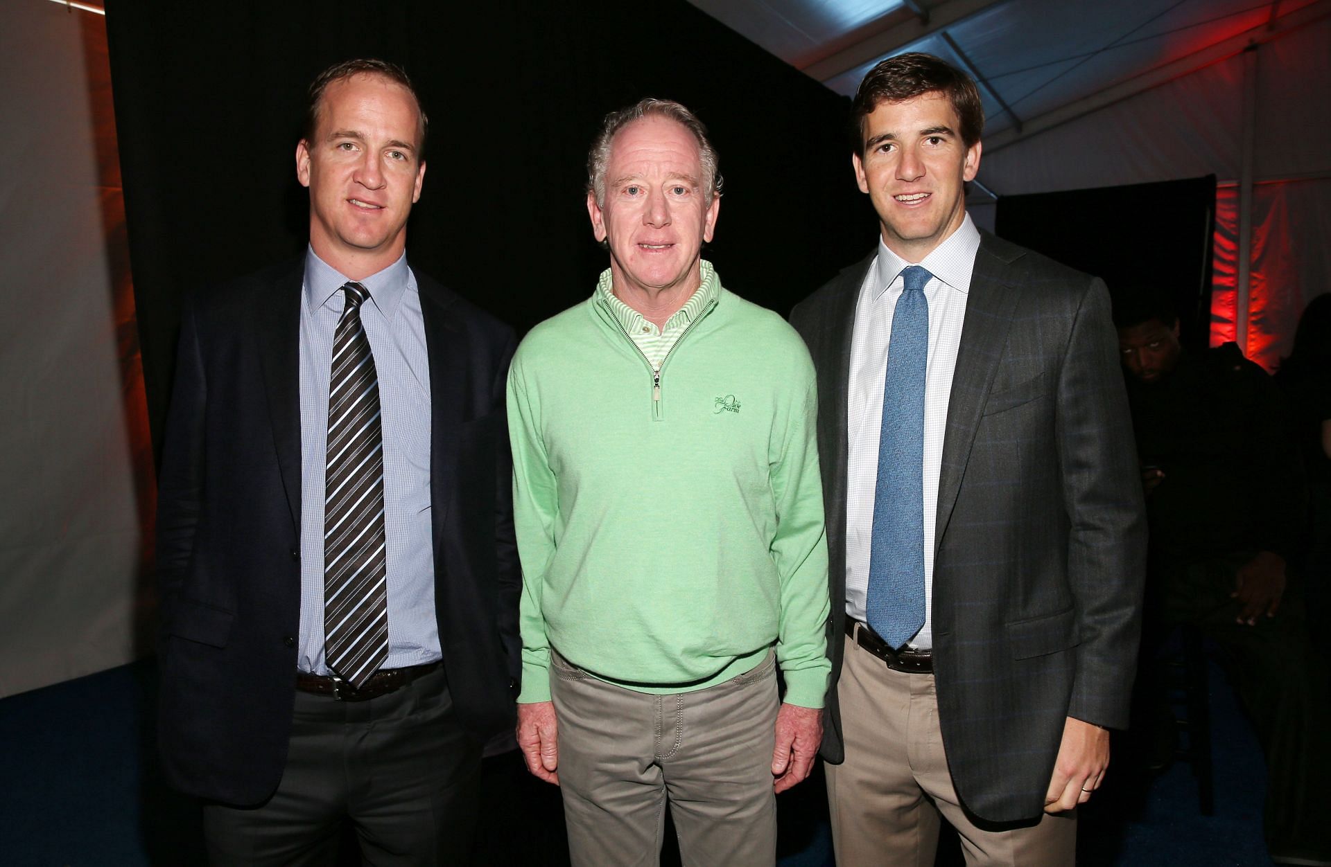 Former NFL quarterbacks Peyton Manning, Archie Manning, and Eli Manning