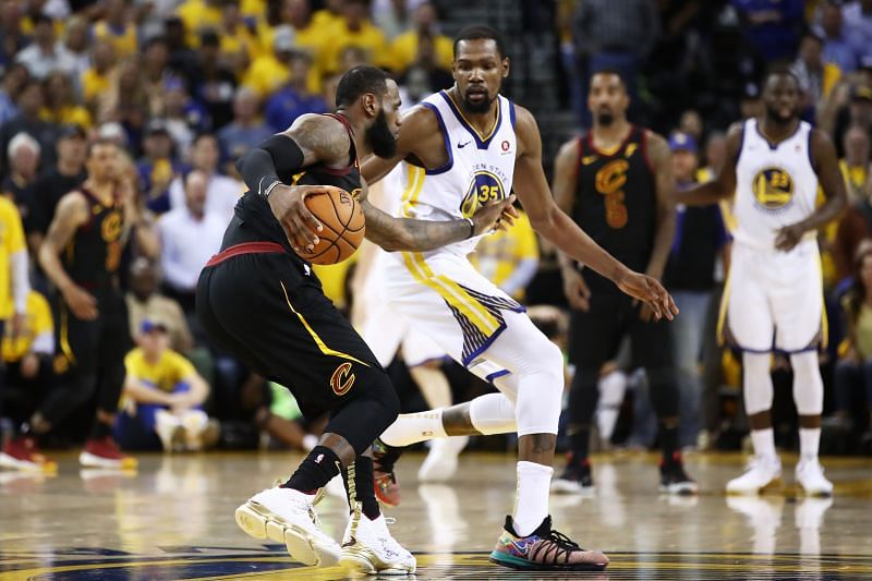 LeBron James closely guarded by Kevin Durant at the 2018 NBA Finals