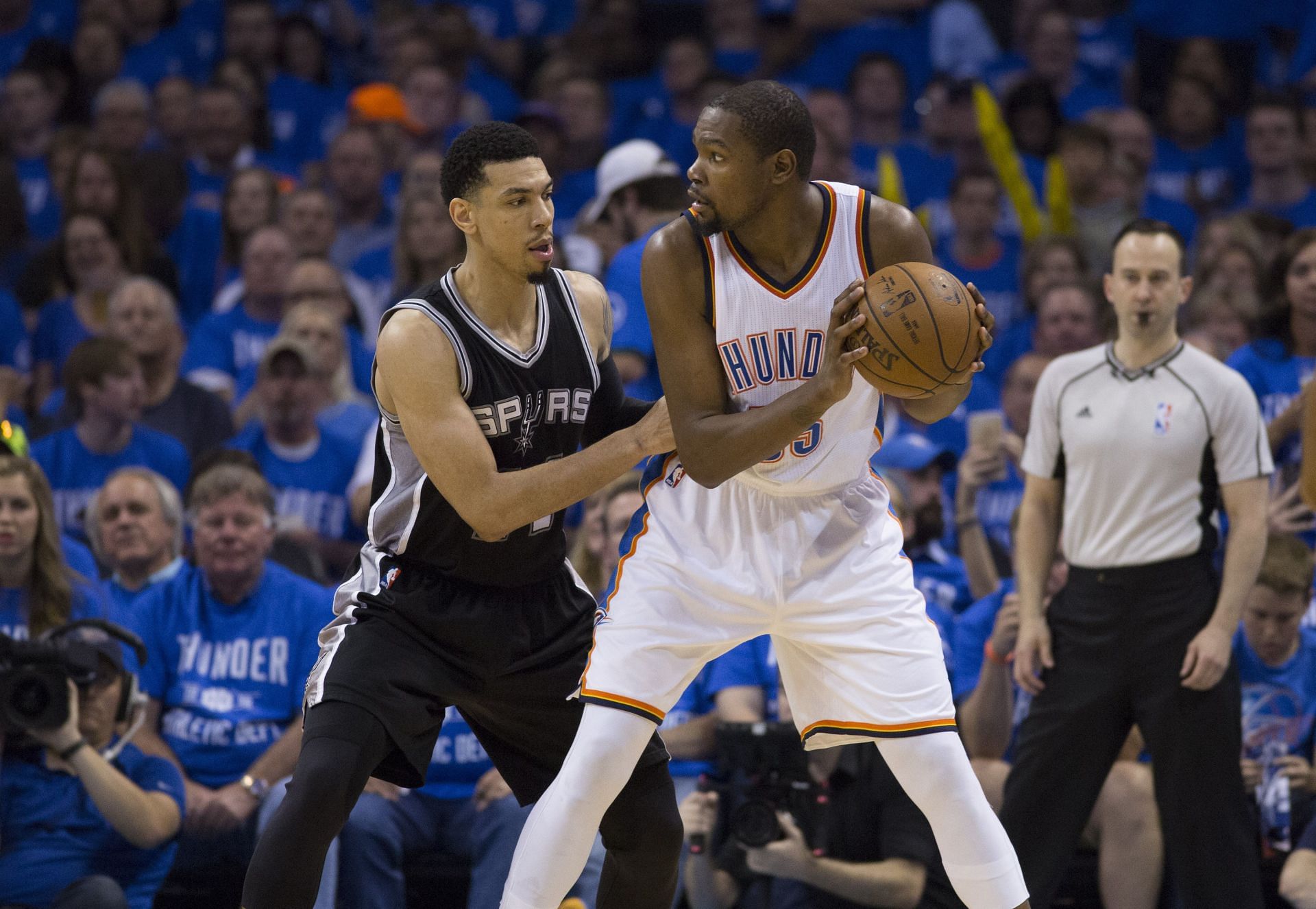 Kevin Durant #35 of the Oklahoma City Thunder and Danny Green #14 of the San Antonio Spurs