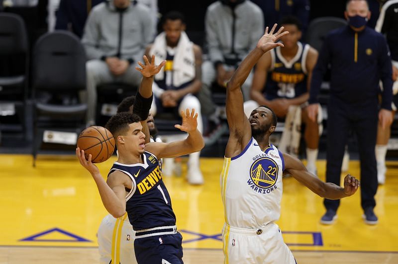 A snap from a clash between the Denver Nuggets and the Golden State Warriors.