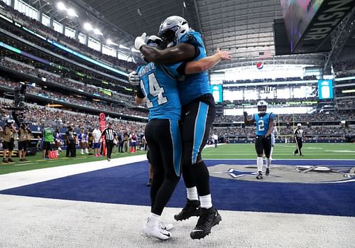 Carolina Panthers QB Sam Darnold celebrates against the Dallas Cowboys