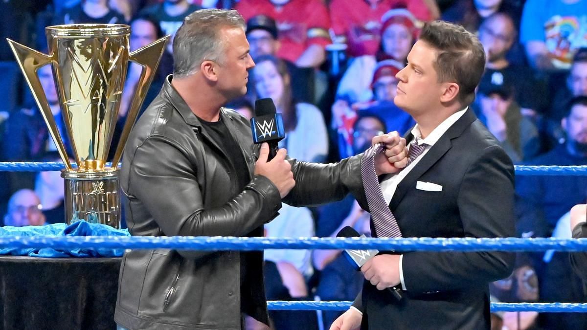Former WWE ring announcer Greg Hamilton with Shane McMahon