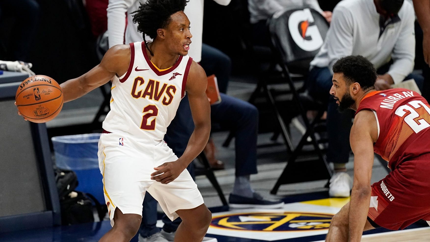 Collin Sexton of the Cleveland Cavaliers against Denver Nuggets&#039; Jamal Murray [Source: AP]
