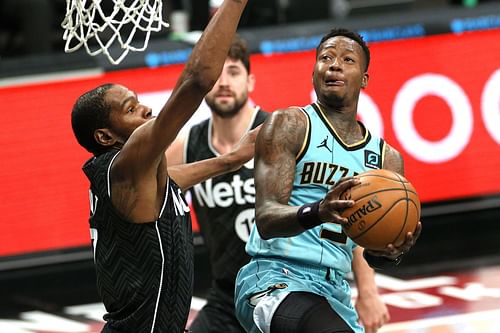 Terry Rozier of the Charlotte Hornets against Kevin Durant of the Brooklyn Nets