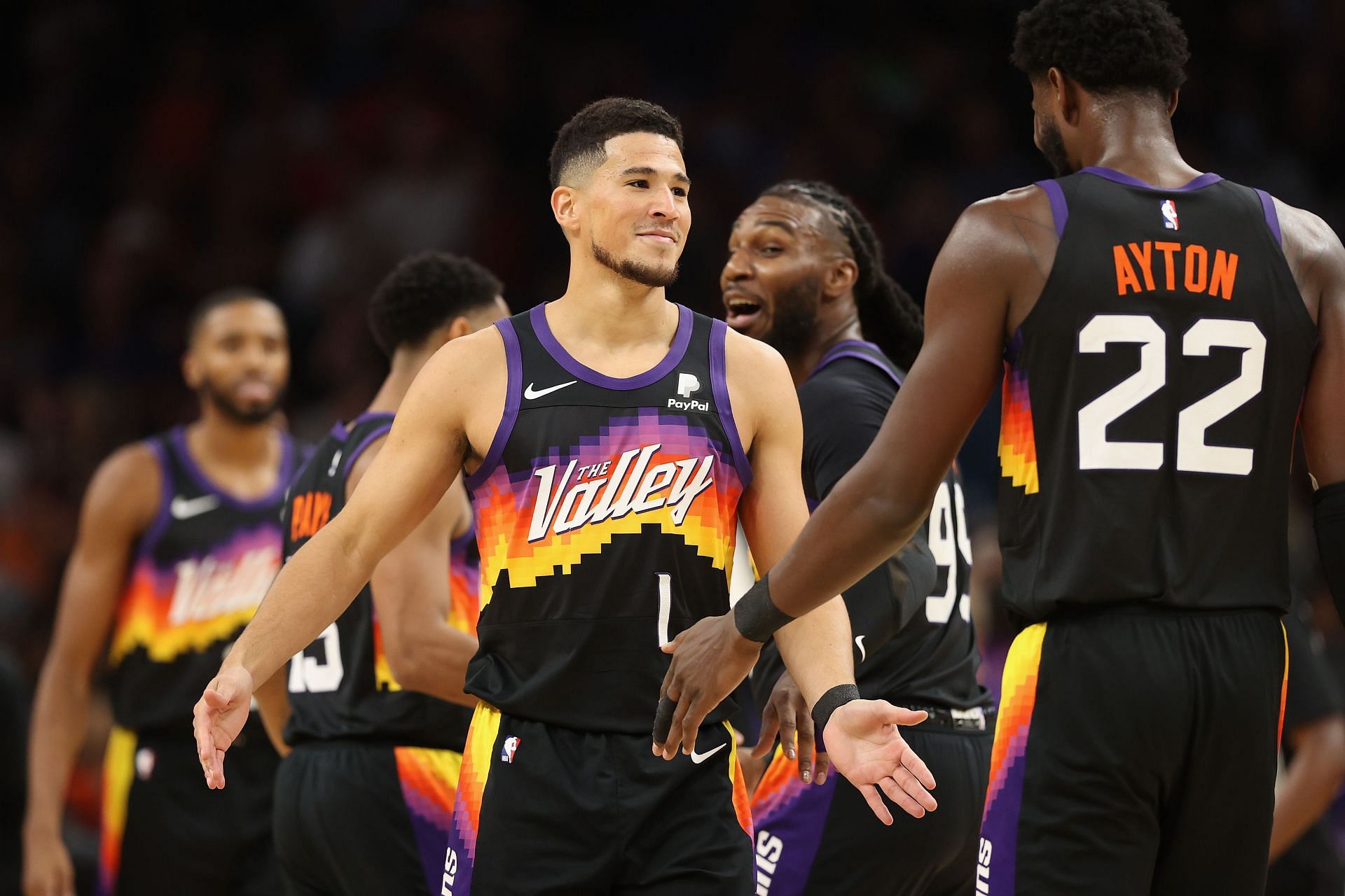 The Phoenix Suns celebrate a point against the Denver Nuggets