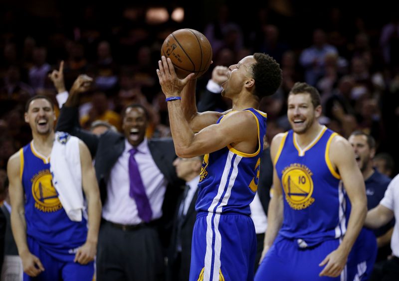 Stephen Curry and the Golden State Warriors celebrate their NBA Finals win