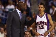 Phoenix Suns head coach Terry Porter talks with Steve Nash #13 during the second quarter of a preseason game