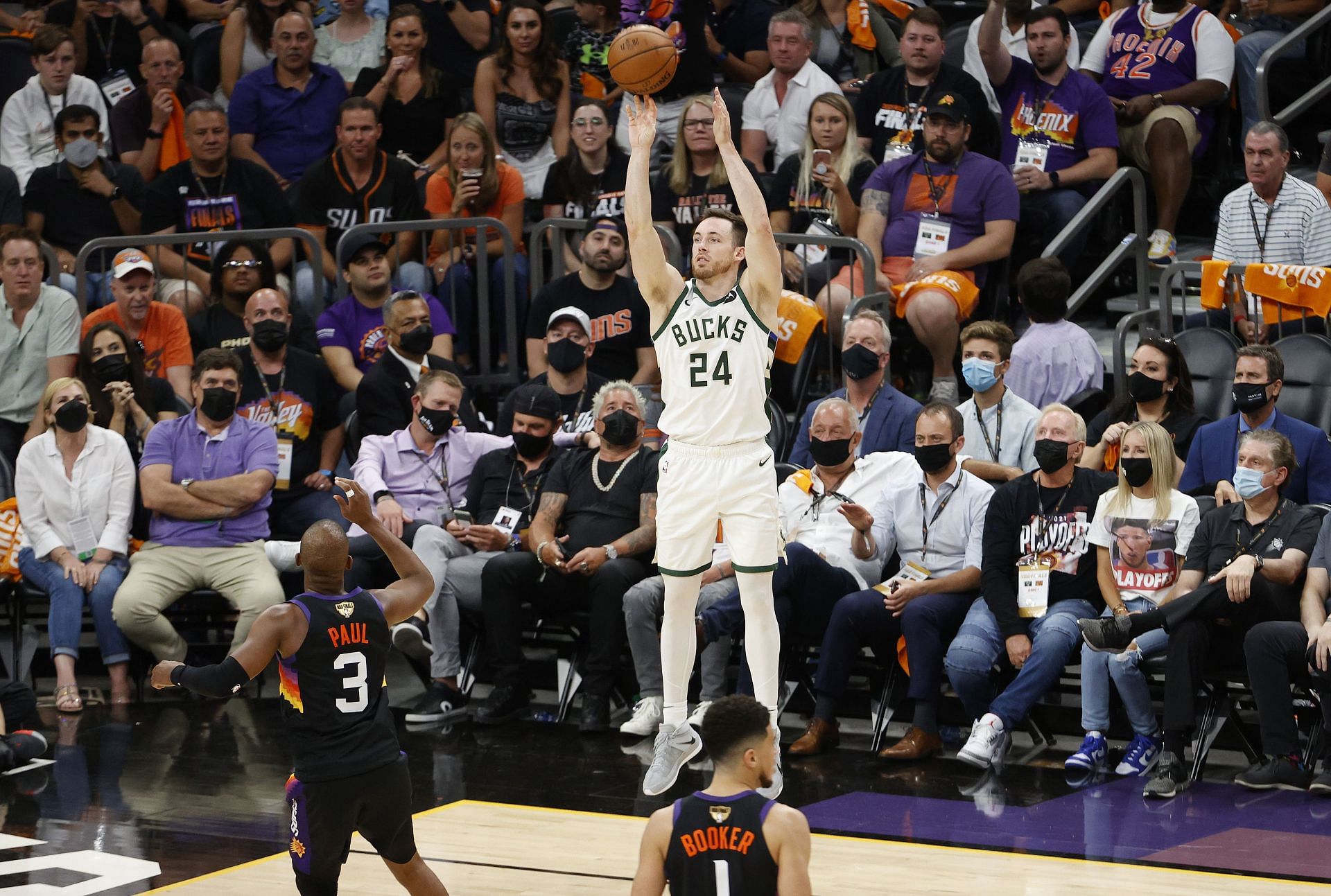 Pat Connaughton #24 of the Milwaukee Bucks shoots against the Phoenix Suns during the second half in Game One of the NBA Finals at Phoenix Suns Arena on July 06, 2021 in Phoenix, Arizona.
