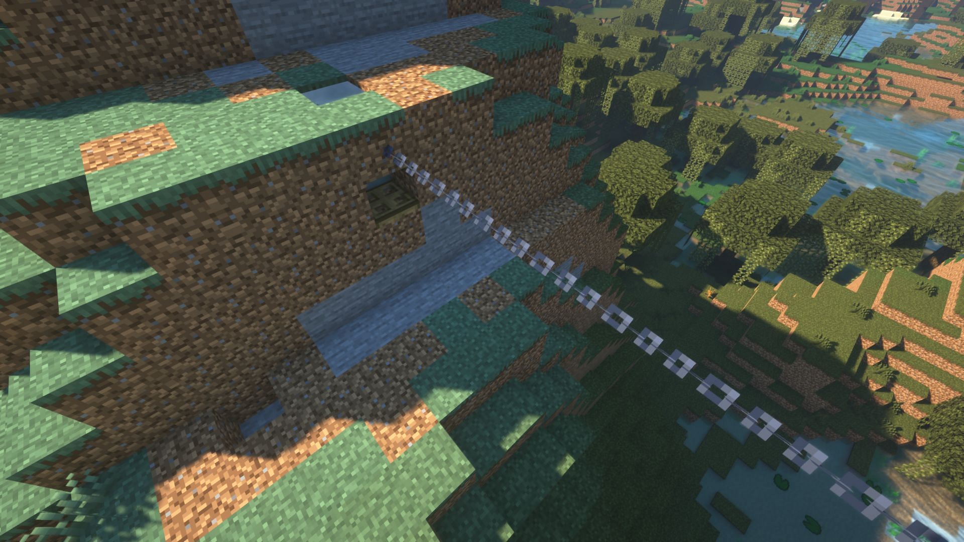 A very basic zipline design carved into the side of a large hill (Image via Mojang).
