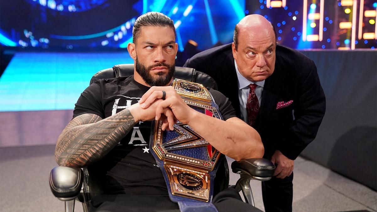 Roman Reigns (left) and Paul Heyman (right)