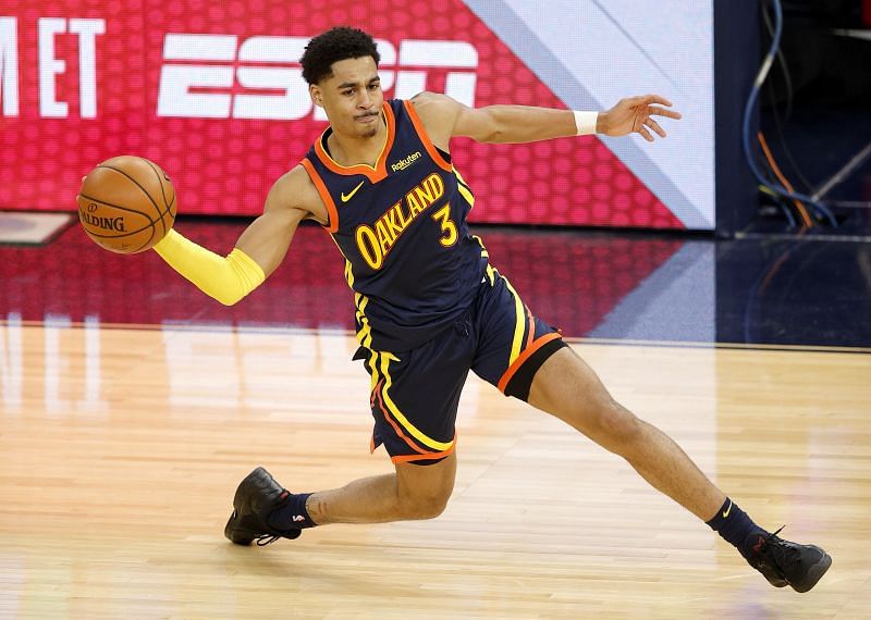 Golden State Warriors shooting guard Jordan Poole making a pass