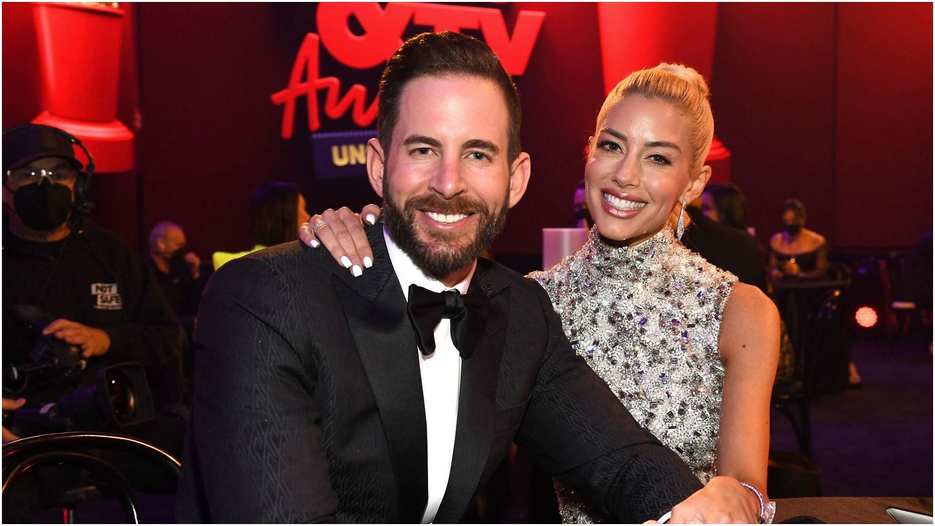 Tarek El Moussa and Heather Rae Young attend the 2021 MTV Movie &amp; TV Awards: UNSCRIPTED in Los Angeles (Image via Getty Images)