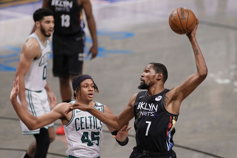 Boston Celtics gaurd Romeo Langford #45 gaurdingBrooklyn Nets All-Star Kevin Durant #7 in the playoffs