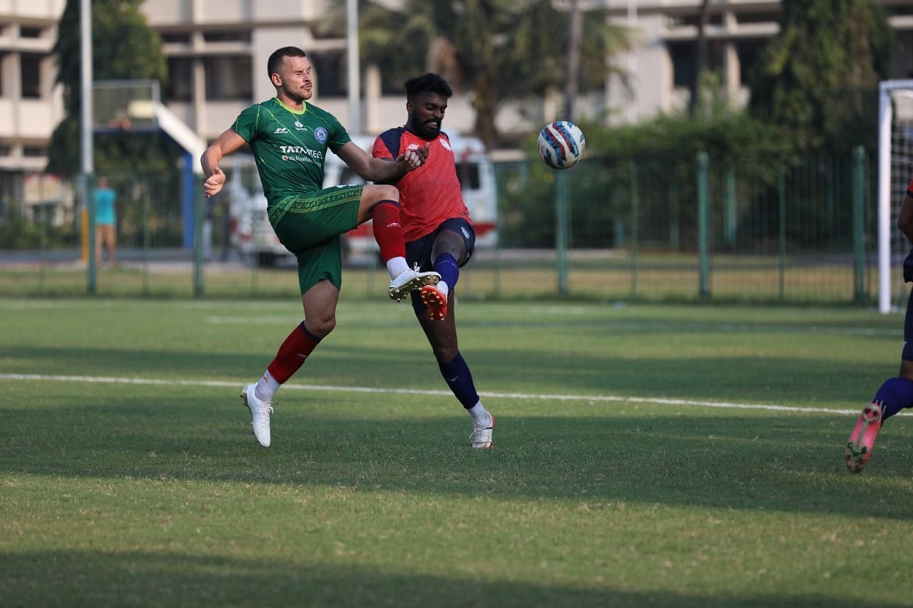 Murray (in green) in action against NEUFC. Courtesy - Jamshedpur FC Media Team