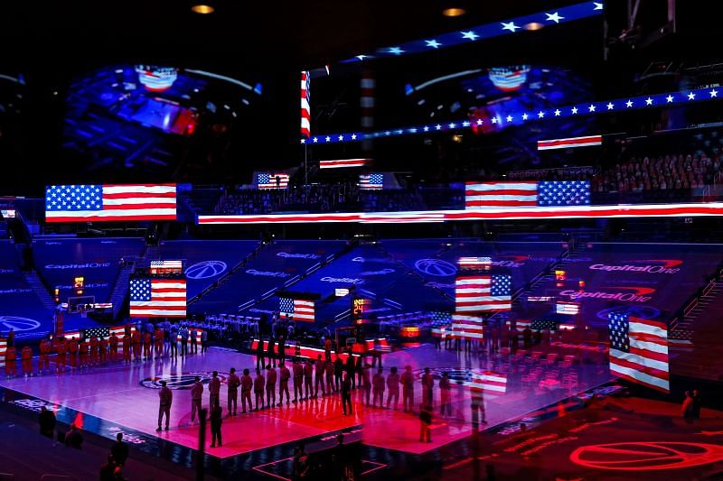 The Washington Wizards and the Atlanta Hawks in a pre-game ceremony.