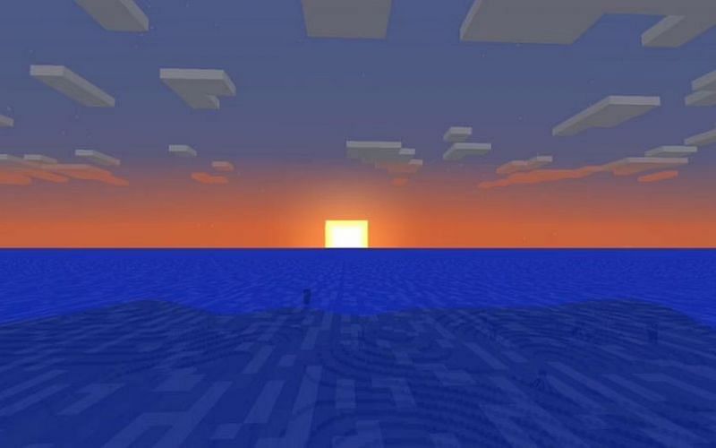 An image of a sunset over an in-game ocean. (Image via Minecraft.)