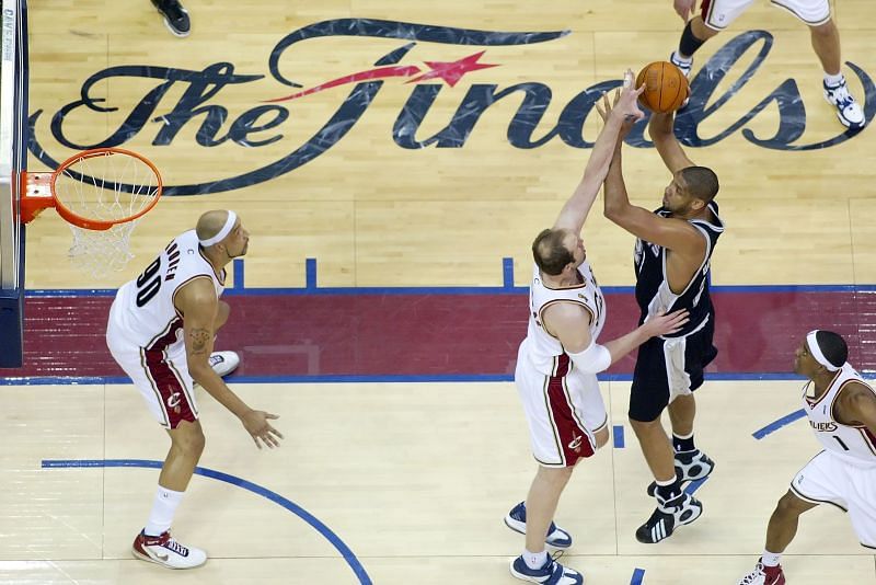 Tim Duncan (#21) of the San Antonio Spurs shoots a jump shot.