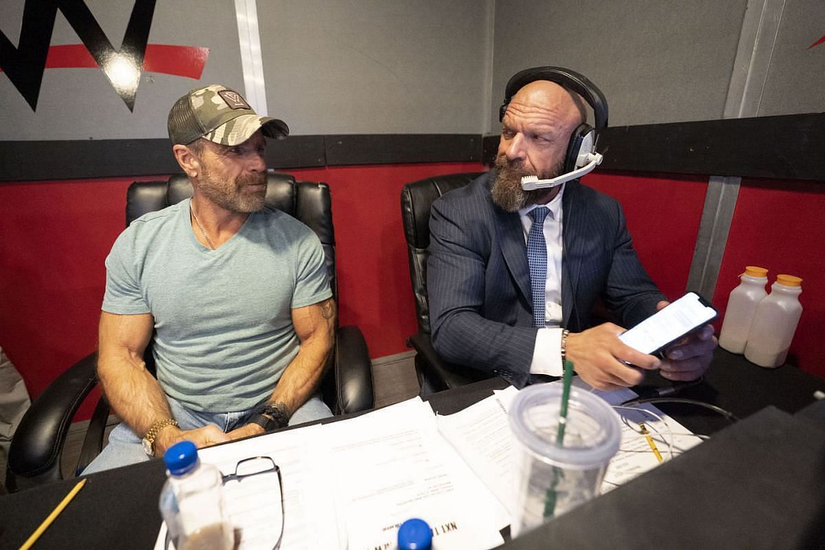 Shawn Michaels and Triple H producing backstage at NXT