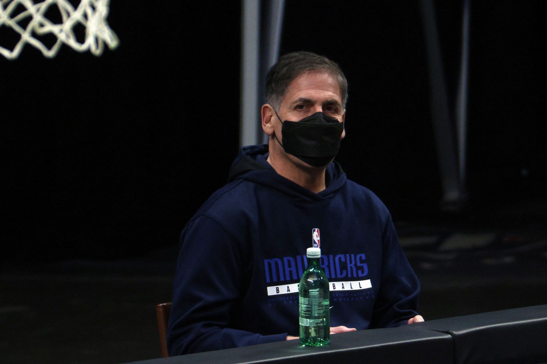 Dallas Mavericks owner, Mark Cuban supports his team from the sidelines.