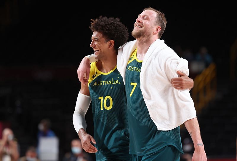 Matisse Thybulle and Joe Ingles after winning a game in the Tokyo Olympics.