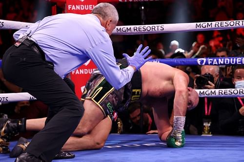 Tyson Fury receives a count from the referee