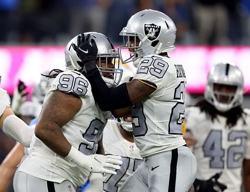 Las Vegas Raiders corner Casey Heyward Jr. celebrates with teammate Darius Philbin