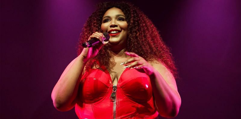Lizzo disappoints fans after praising controversial rapper Chris Brown (Image via Getty Images)
