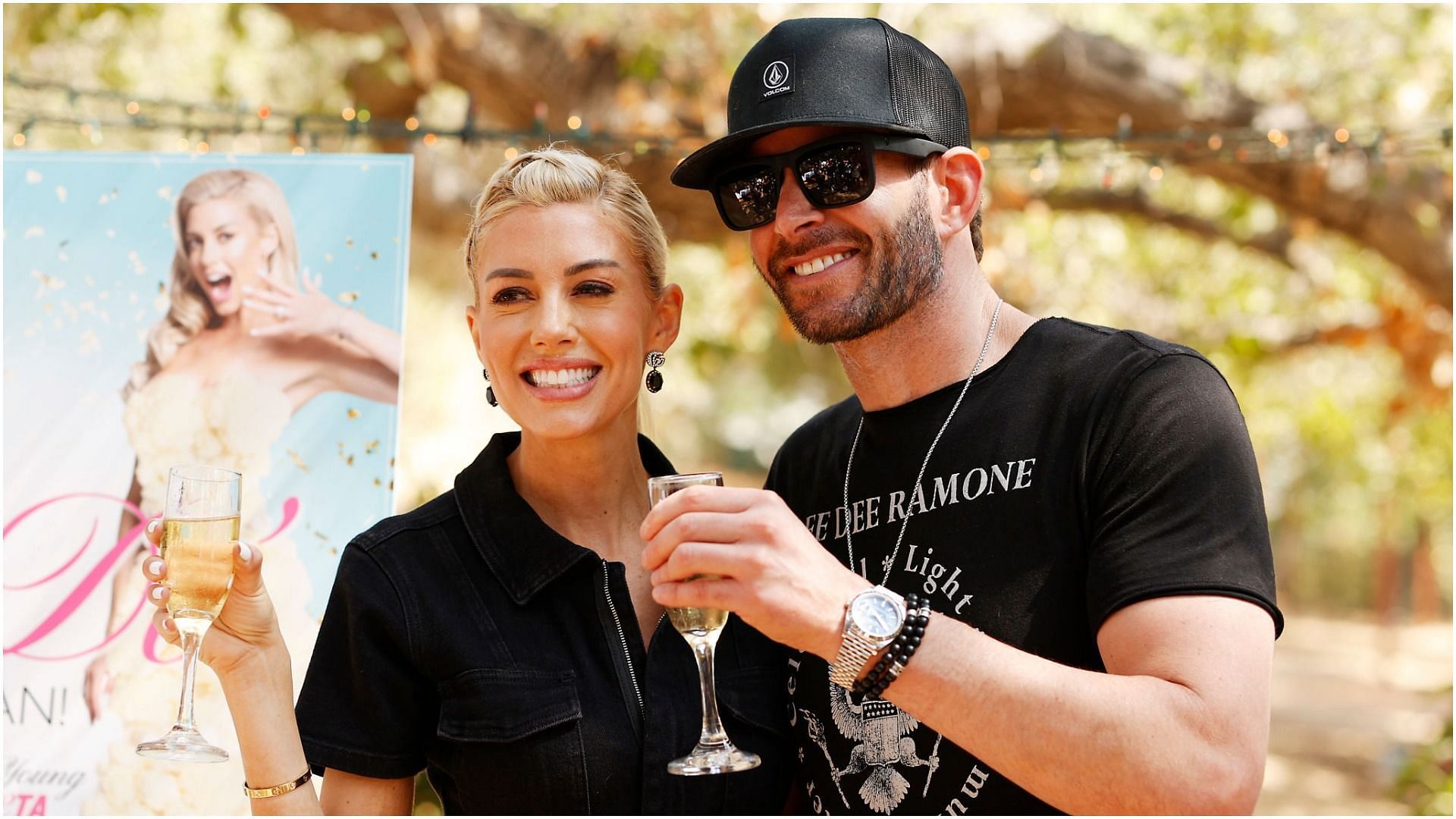 Heather Rae Young and Tarek El Moussa attend the PETA bridal shower in September 2021 (Image via Getty Images)