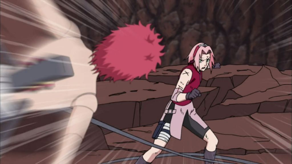 Sakura winds up on an approaching Sasori, channeling her year and a half of training with Lady Tsunade (Image via Studio Pierrot)