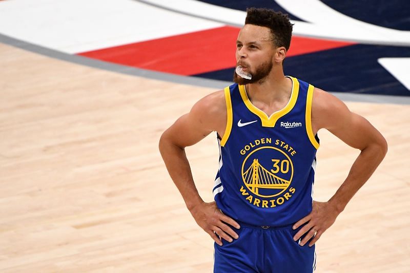 Stephen Curry #30 of the Golden State Warriors reacts after a play against the Washington Wizards during the first half at Capital One Arena on April 21, 2021 in Washington, D.C.